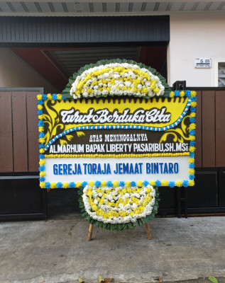 Papan Bunga Duka di Bunguran Selatan
